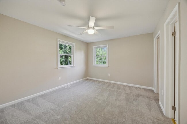 Building Photo - Available Immediately – 4 Bedroom End-Unit...