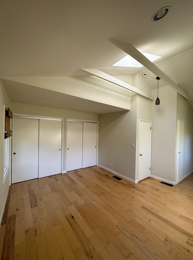 Double closets (with interior lighting), entry door, and linen closet - 19876 Observation Dr