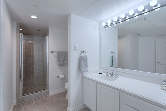 Building Photo - Gorgeous Mediterranean-style condo located...