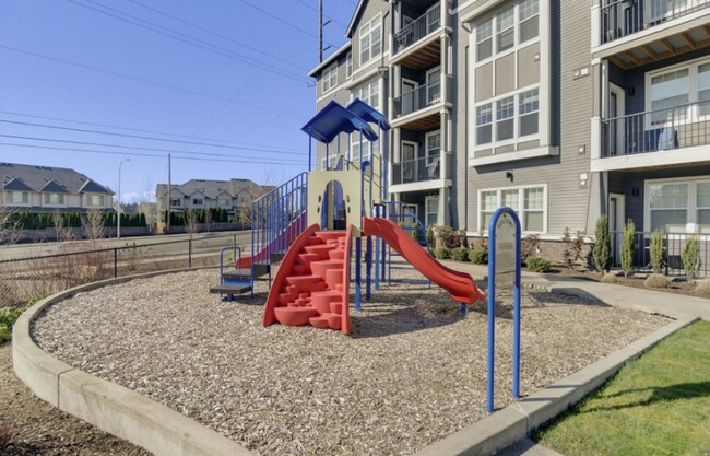 Building Photo - Modern Ground-Level Condo in River Terrace...
