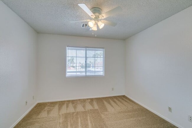 Building Photo - Charming Second-Floor Condo with Two Bedrooms and Fireplace