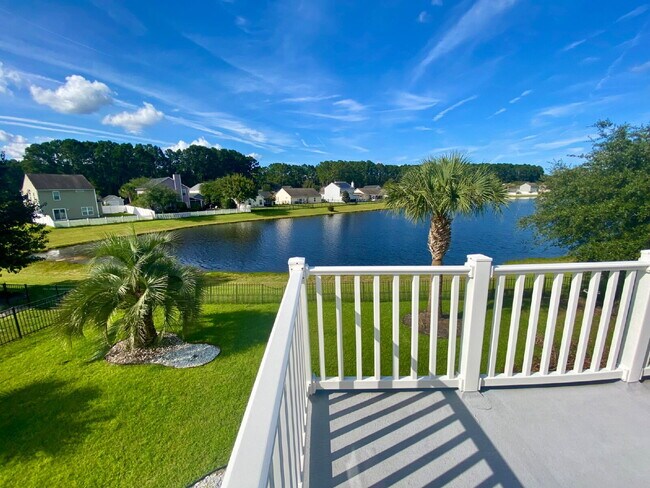 Building Photo - Three Bedroom Home with fenced-in Backyard oasis!