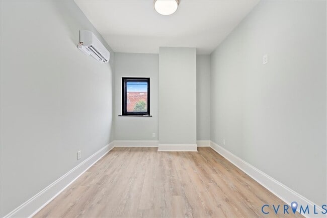 Building Photo - 207 E Broadway
