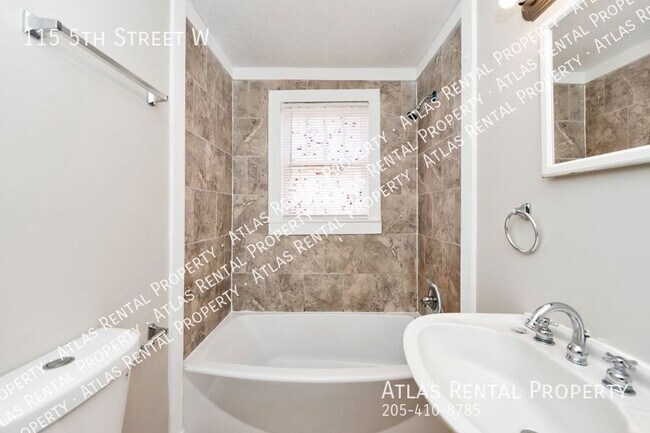 Building Photo - 115 5th St W