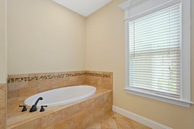 Building Photo - 3 Bedroom Dunham Marsh Beauty with Outdoor Fireplace and Resort-Style Community Amenities