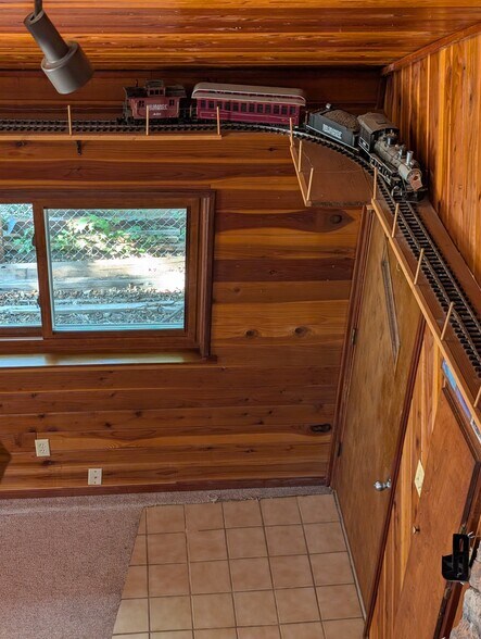 train track around hot tub room - 28 James Circle