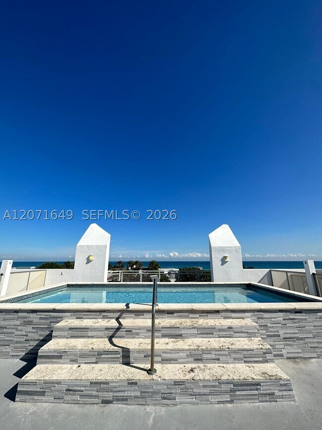 Building Photo - 7728 Collins Ave