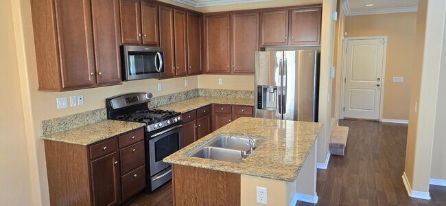 Building Photo - Beautifully maintained 2-bedroom, 2.5-bath with Loft • 1,504 sqft & 2-car garage.