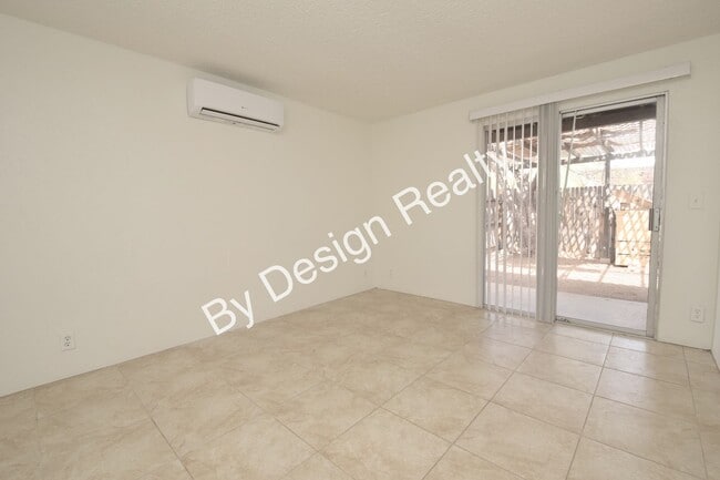 Building Photo - Updated 2 Bed 1 Bath Duplex with Fresh Paint, Ductless Heating/Cooling and Private Yard