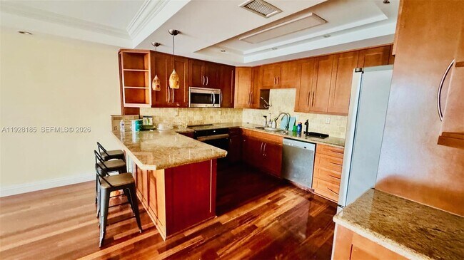 Building Photo - 19390 Collins Ave