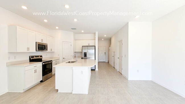 Building Photo - OUTSTANDING BRAND NEW TOWNHOME! SKYE RANCH...