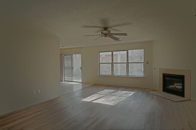 Building Photo - NE Heights Townhome Available For Move In