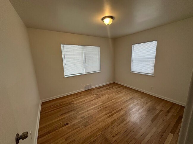 Building Photo - Spacious 4 Bedroom Home | 2 Living Rooms | Large Fenced Yard | 1,700+ Sq Ft