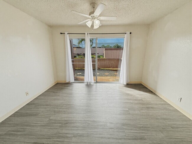 Building Photo - Updated Ground-Floor 1BR Condo in Palm Villas II