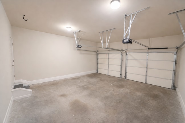 Building Photo - Gated Johns Creek Townhome Offering Space, Privacy, and Everyday Convenience