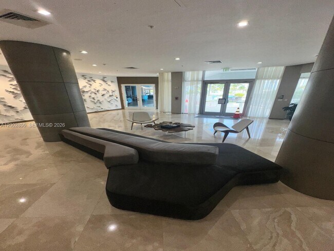 Building Photo - 10275 Collins Ave