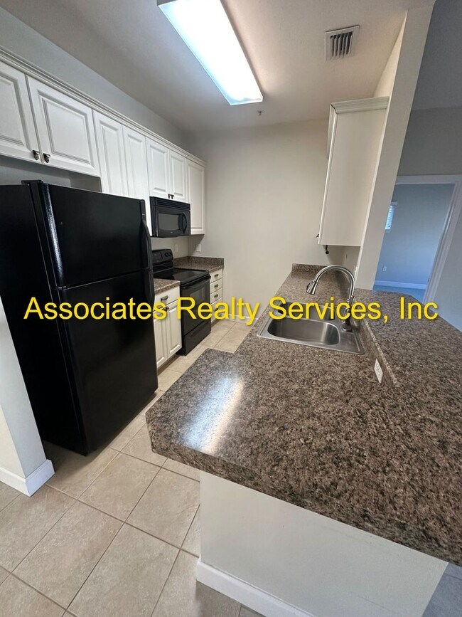 Building Photo - Live in Haile Market Square!  Now Available – 2nd Floor 3BR/2BA unit