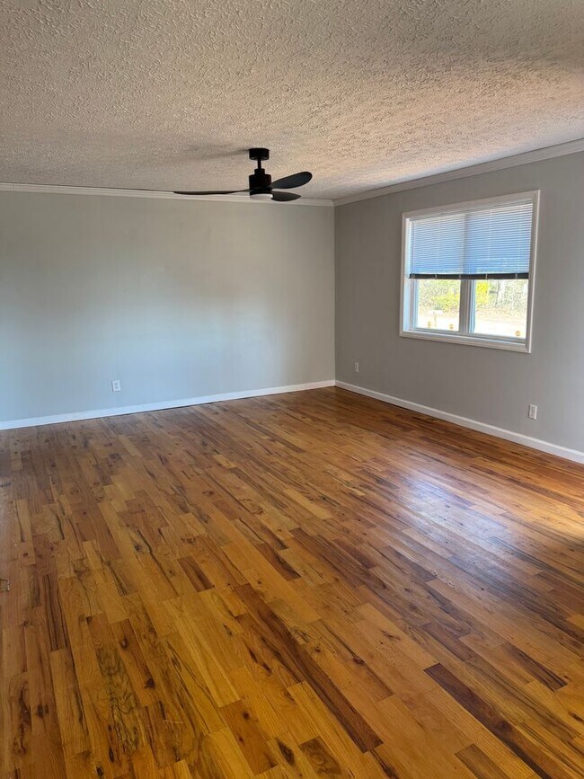 Building Photo - Spacious 4-Bedroom Rural Home on Private Acreage