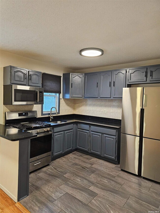 Building Photo - 29-39-39 Curtis St