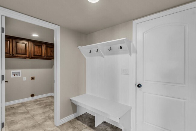 Building Photo - Spacious Syracuse Home with Covered Deck, Loft & Oversized 3-Car Garage