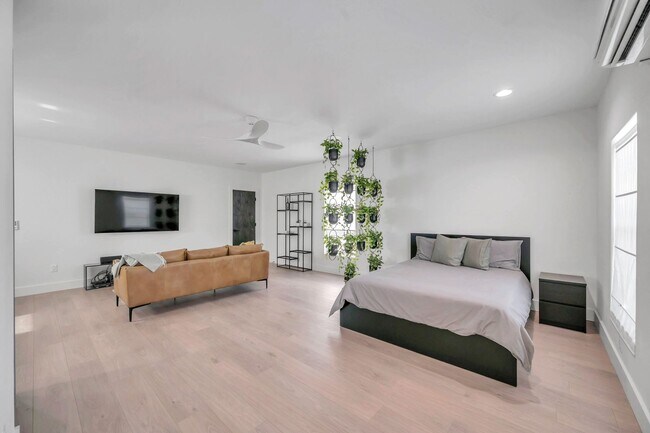 Building Photo - Luxury Living in Grand Central District: Exquisite Furnished Home with Pool