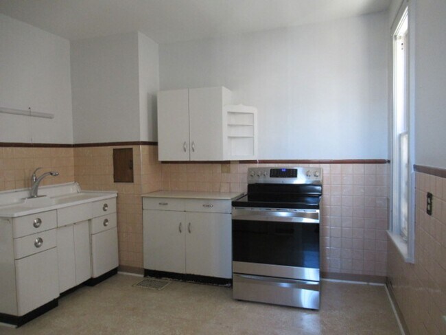 Building Photo - Eastside Home-three-bedroom with office and two car off street parking