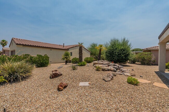 Building Photo - STUNNING Home with New AC in Exclusive 'Th...