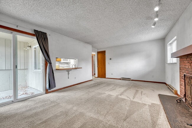 Building Photo - $1,245.95, 1 bed, 1 bath, garden level Condo with Washer/Dryer