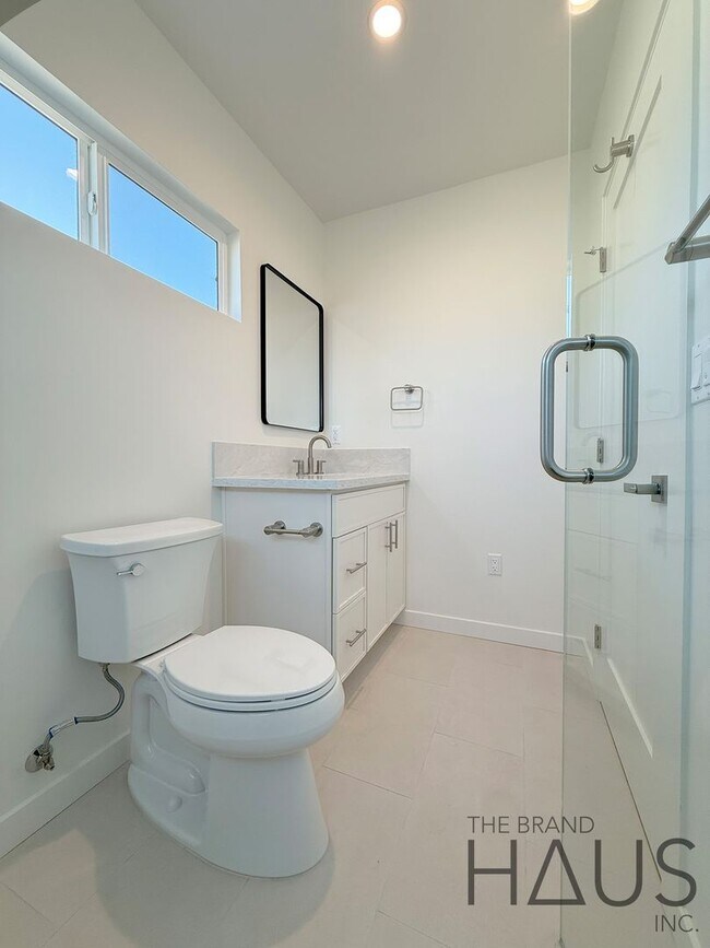 Building Photo - Brand-New 1-Bedroom, 1-Bathroom, 1-Compact Carport - Vaulted Ceilings in Belmont Heights