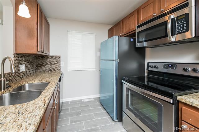 Building Photo - 6996 W 79th Dr