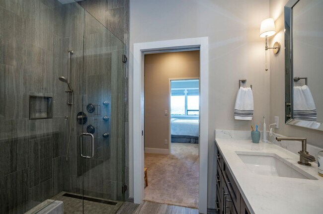 Building Photo - Sweeping waterfront views in this 2-Bedroo...