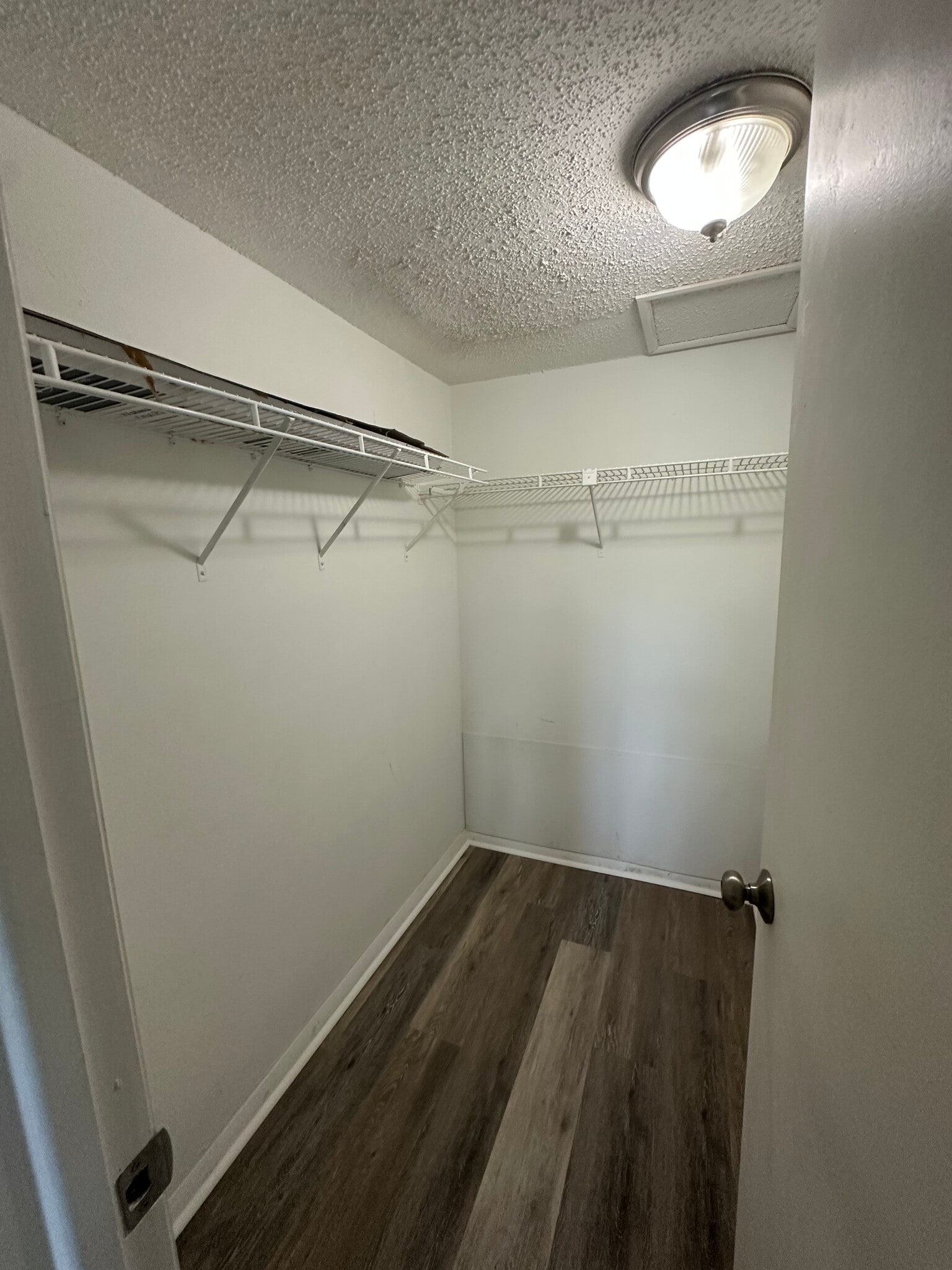 Walk-in closet in the master bedroom - 1000 Tarpon Woods Blvd
