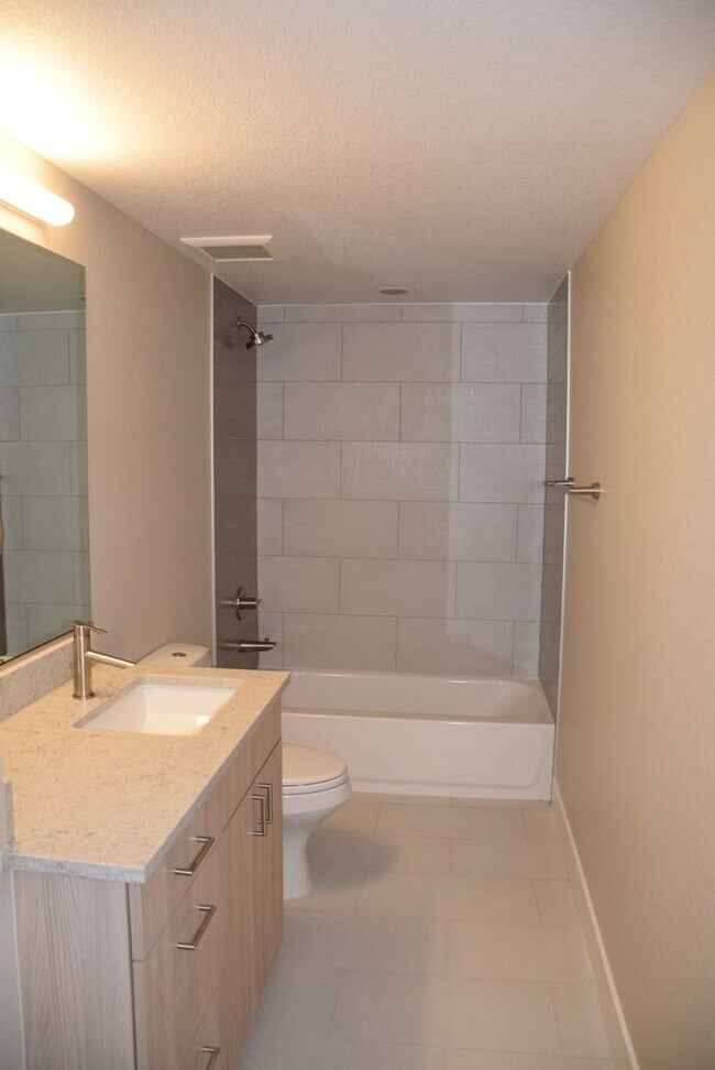 Building Photo - 3 bedroom / 3.5 bath Townhome + 2 Large Flex Spaces & Spacious Roof Top Deck!