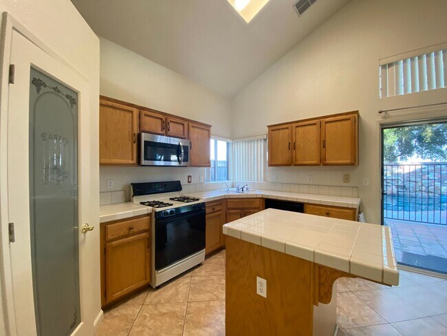 Building Photo - Spacious Home with a Pool & Hot Tub!