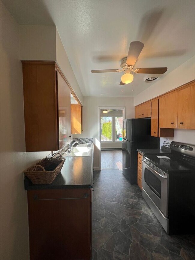 Building Photo - Your Mt. Tabor Oasis: Huge Yard, Oversized Shop-Garage & Sun-Drenched Living!