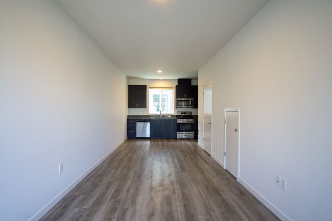 Building Photo - St. Johns-Sleek Modern Townhouse Ready Now!