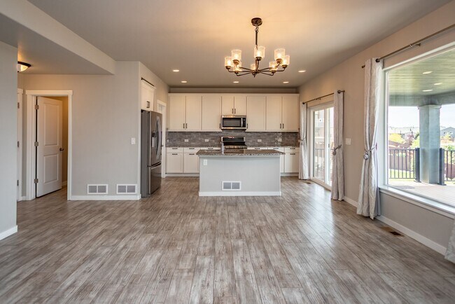 Building Photo - Spacious 5-Bedroom Home with Finished Base...