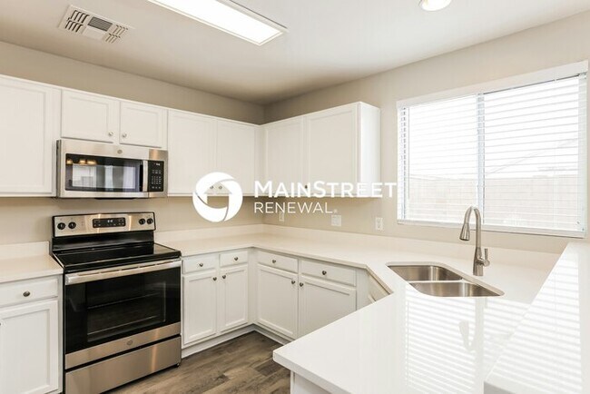Building Photo - 12622 W Paradise Dr