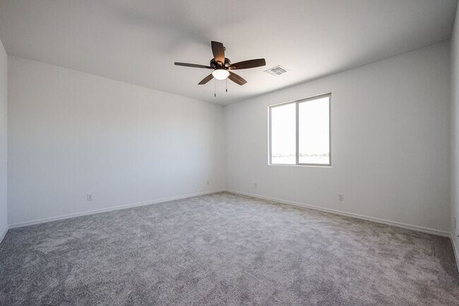 Building Photo - HOME IN LAVEEN! 4 BED 3.5 BA 3 CAR GARAGE!...