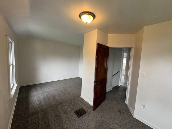 Building Photo - Three bedroom one bathroom 2 story home for rent