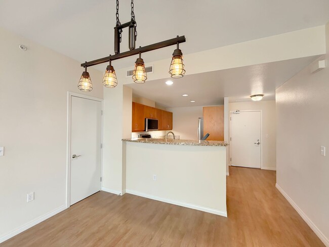 Building Photo - Newly Remodeled 2B/2BA condo w/ Reserved P...