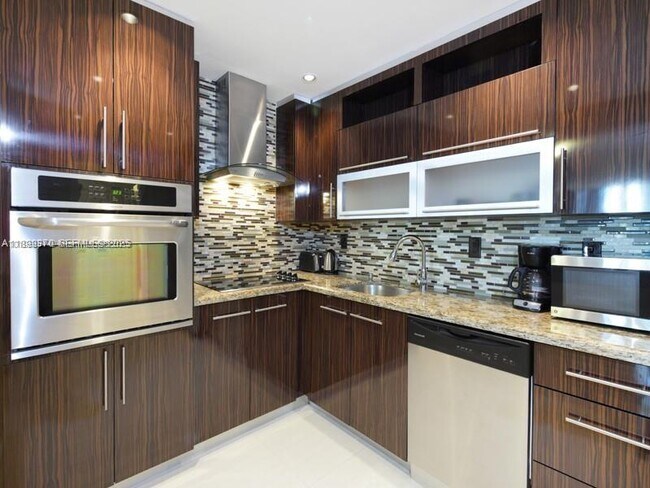 Building Photo - 19390 Collins Ave