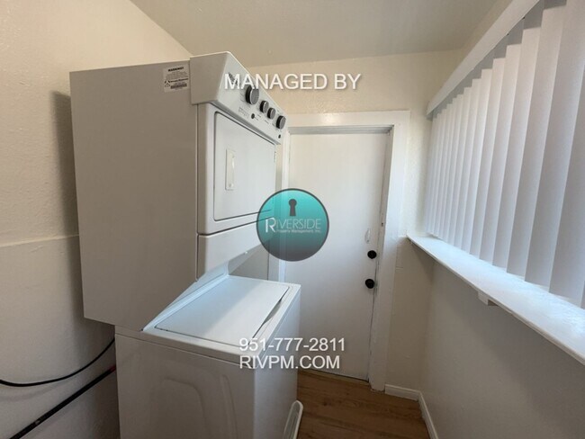 Building Photo - WELCOME TO YOUR NEW HOME IN THE WOOD STREE...