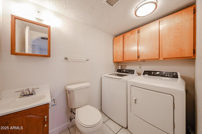 Building Photo - 3408 W Port Au Prince Ln