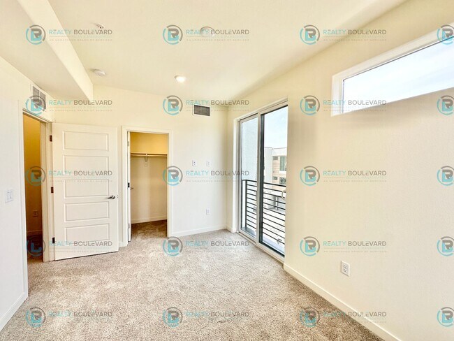 Building Photo - Modern 2 Bedroom 2Bath  Townhome with Dual Patios & Designer Finishes near Truckee River