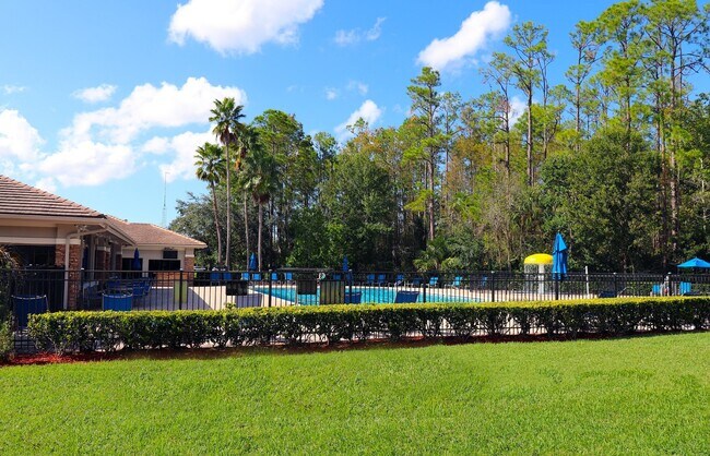Building Photo - Beautiful 4-Bedroom Home in Gated Golf Community – East Orlando