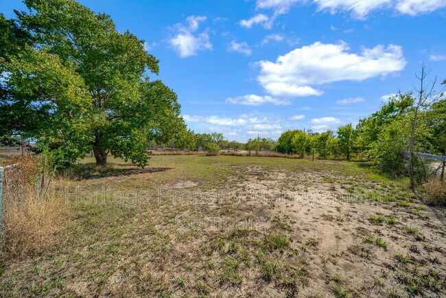 Building Photo - 7590 New Sulphur Springs Rd