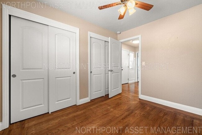 Building Photo - Welcome to this stunning 4-bedroom, 2-bath...