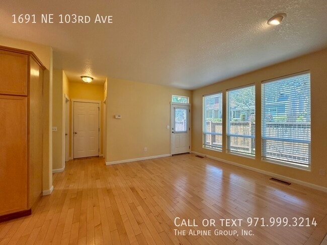 Building Photo - 1691 NE 103rd Ave