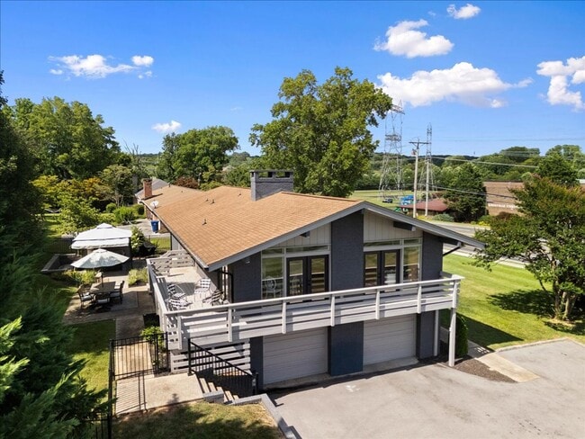 Building Photo - Renovated Mid-Century Modern Home in Belmont West with Finished Basement & Fenced Yard